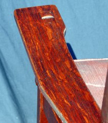 Detail quarter sawed white oak in left arm., 
